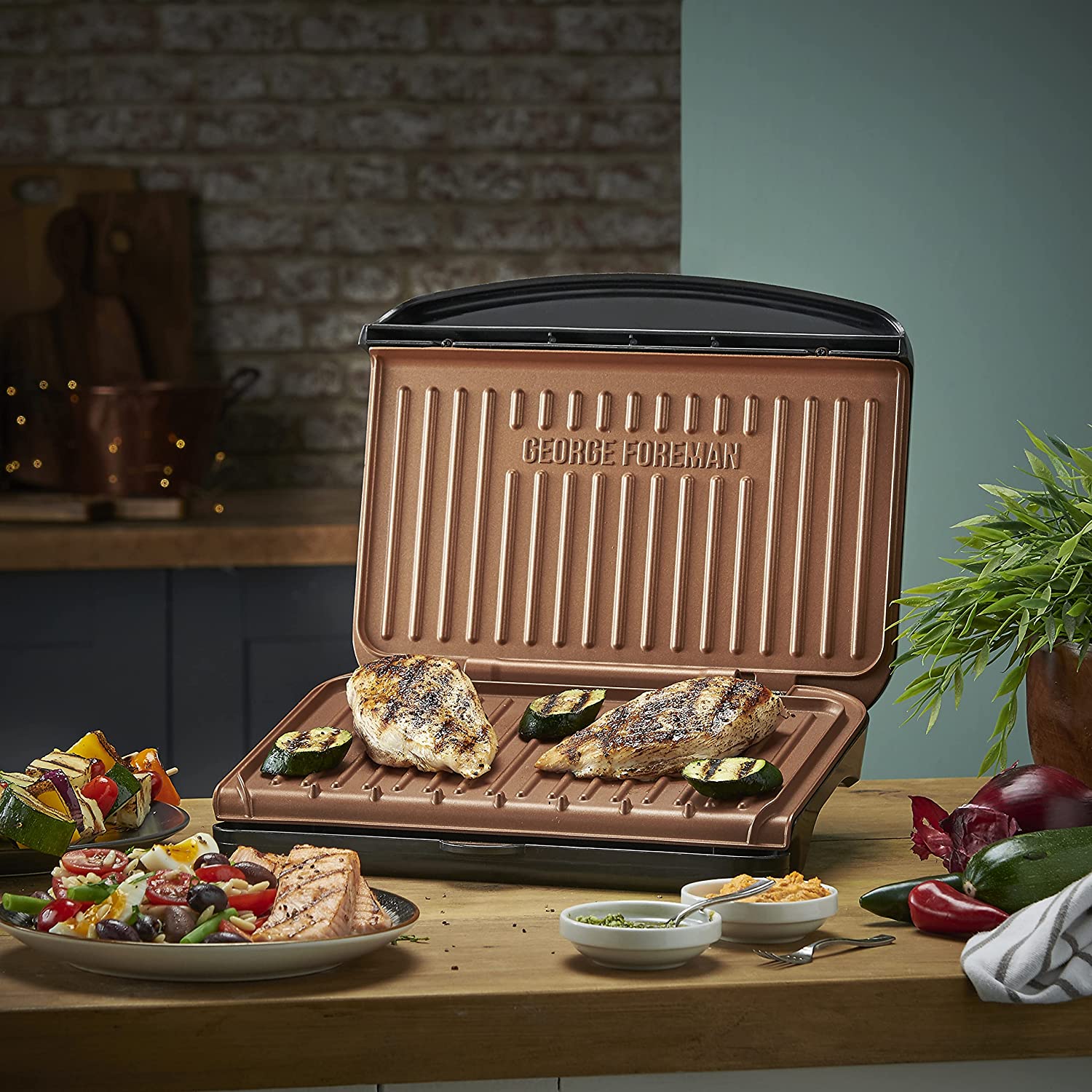 George Foreman Electric Indoor Medium Fit Grill - Versatile Griddle, Hot Plate شواية GEORGE FOREMAN الكهربائية بمقاس متوسط - شبكة متعددة الاستخدامات George Foreman Electric Indoor Medium Fit Grill - Versatile Griddle, Hot Plate شواية GEORGE FOREMAN الكهربائية بمقاس متوسط - شبكة متعددة الاستخدامات